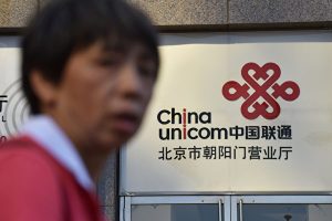 china hong kong stocks merger telecommunication